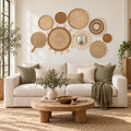 Nine-piece natural woven wall decor set with flower mirror arranged above a sofa
