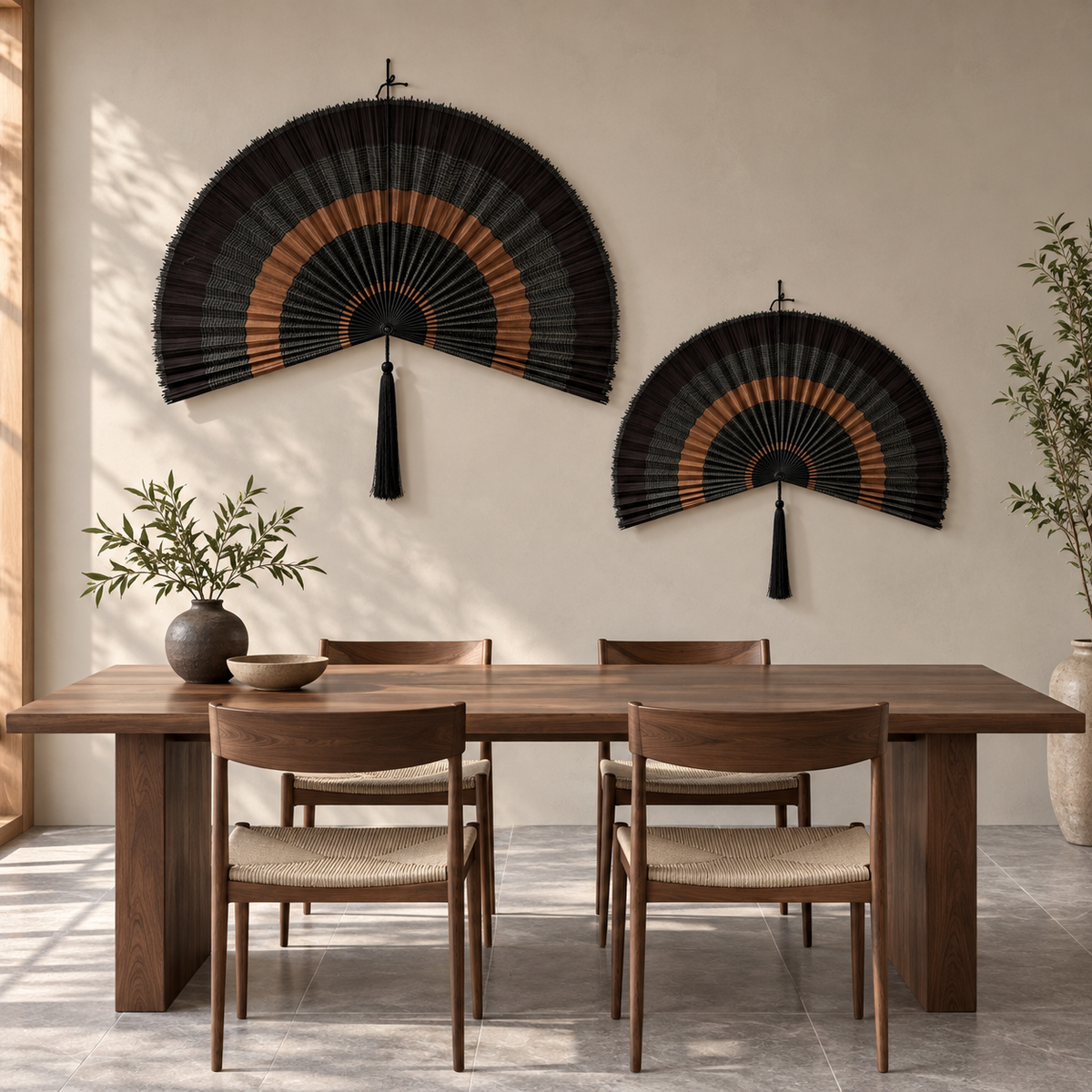 Black and copper fan wall decor in a dining room