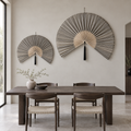Large and small gray bamboo wall fan set in a modern dining room