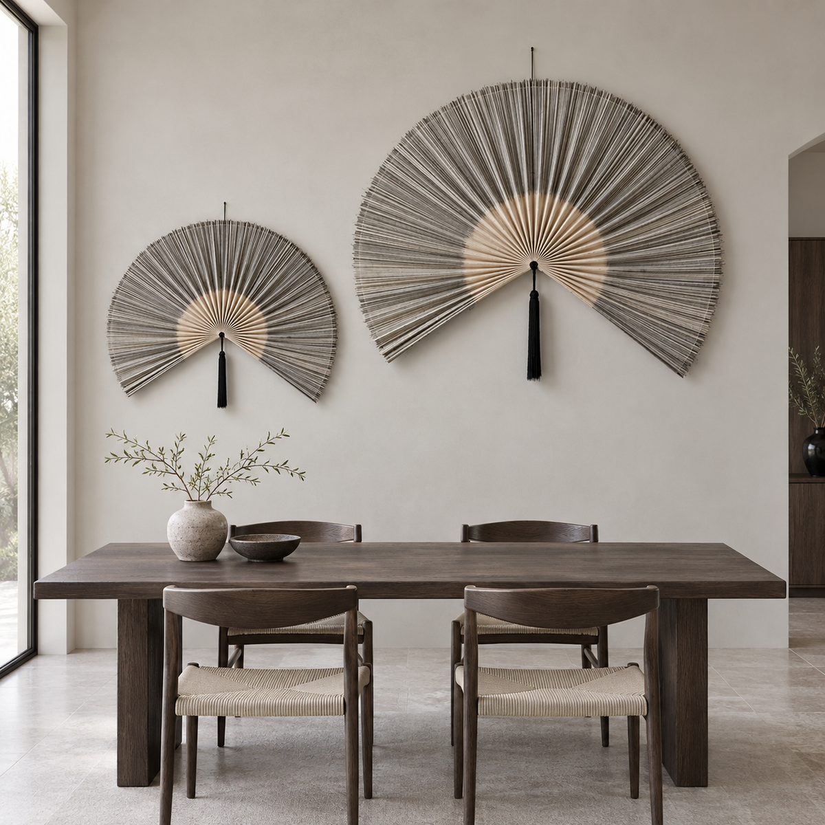 Large and small gray bamboo wall fan set in a modern dining room
