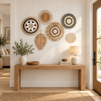 Geometric woven basket and leaf wall art in an entryway