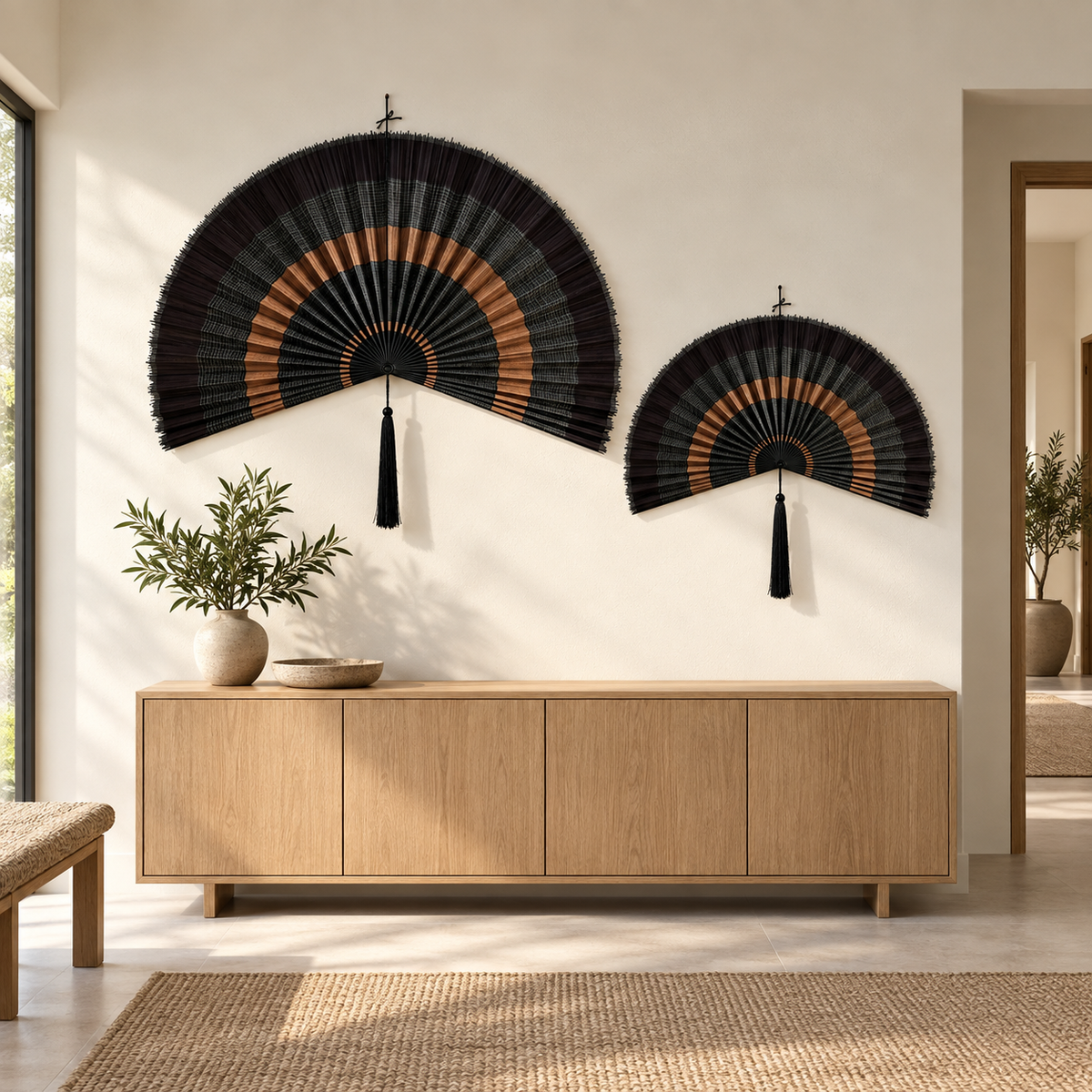 Black and copper fan wall decor above an entryway console