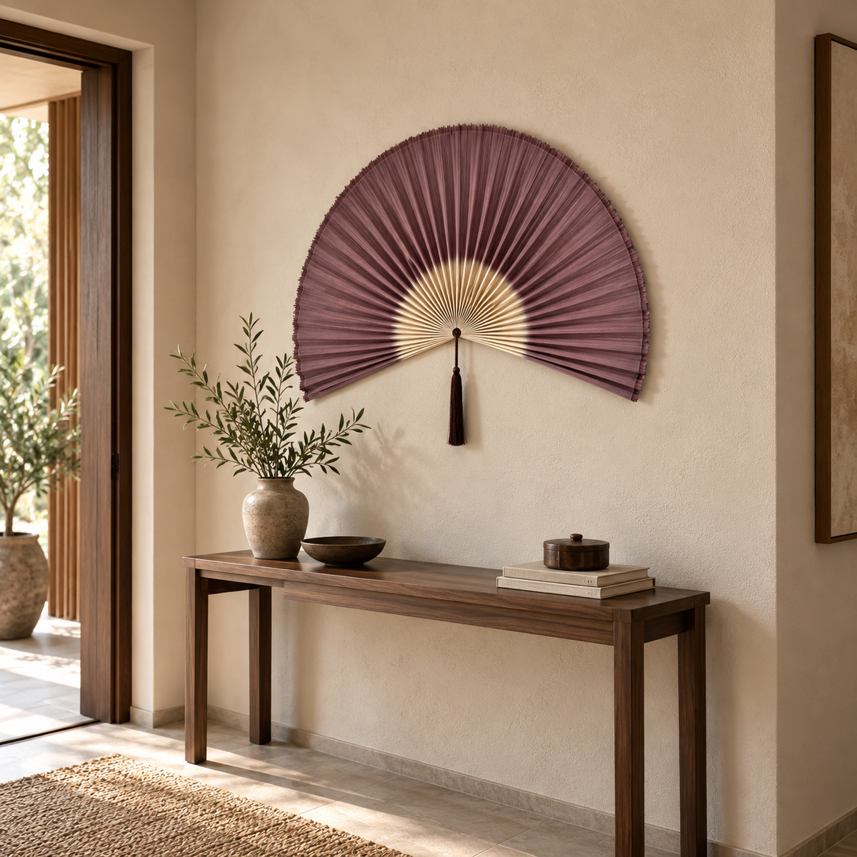Plum Purple & Natural woven wall fan shown from an angled view