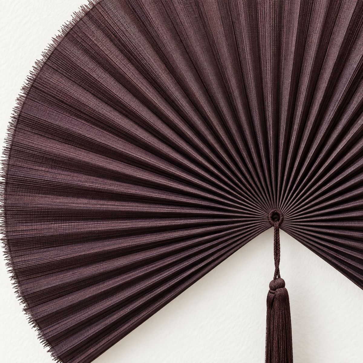Smoky Plum woven wall fan texture and tassel detail