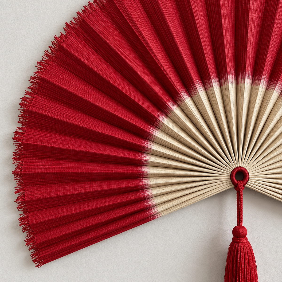 Red & Natural woven wall fan texture and tassel detail