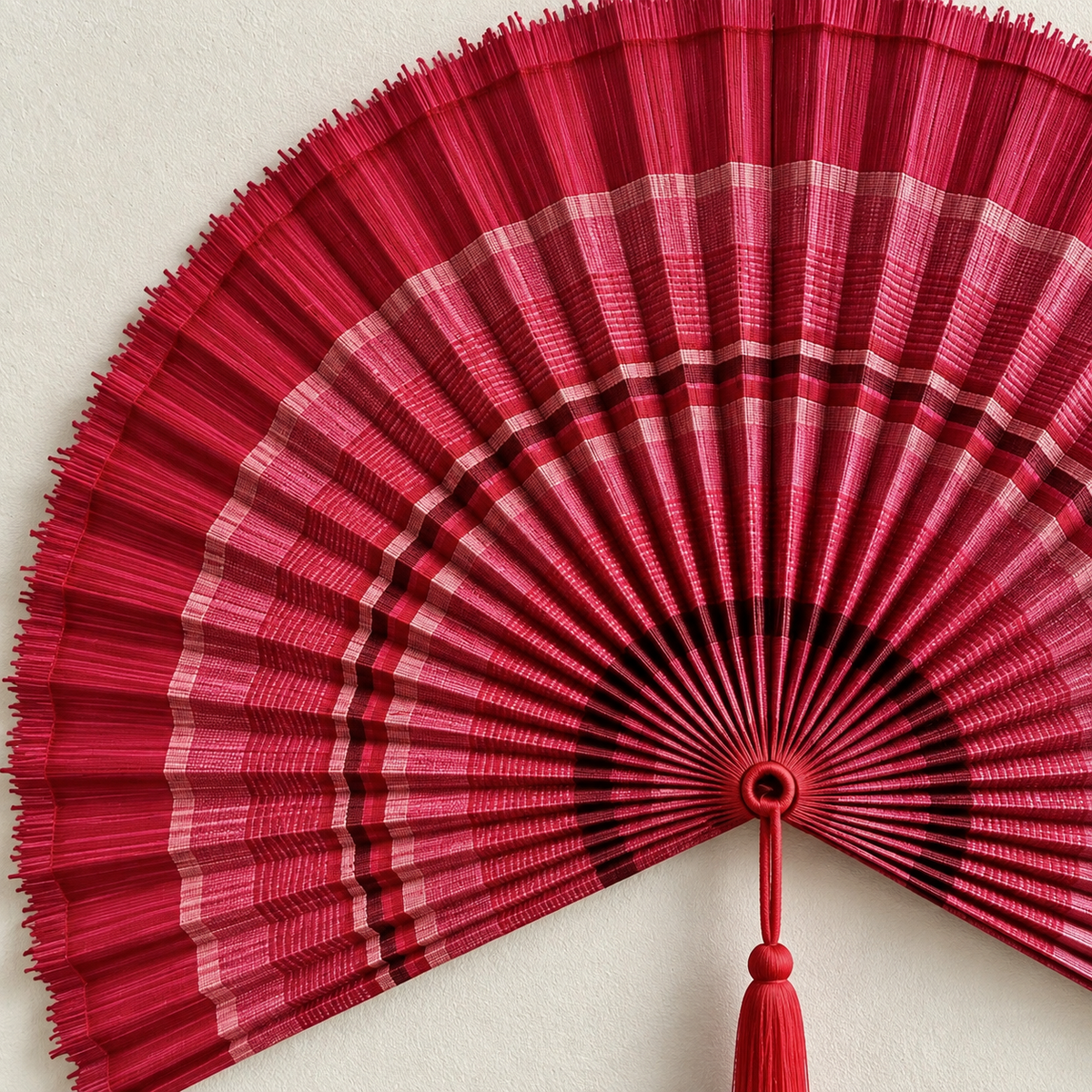 Rose Red Ombre woven wall fan texture and tassel detail