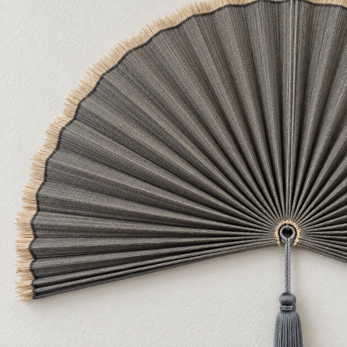 Deep Gray woven wall fan texture and tassel detail