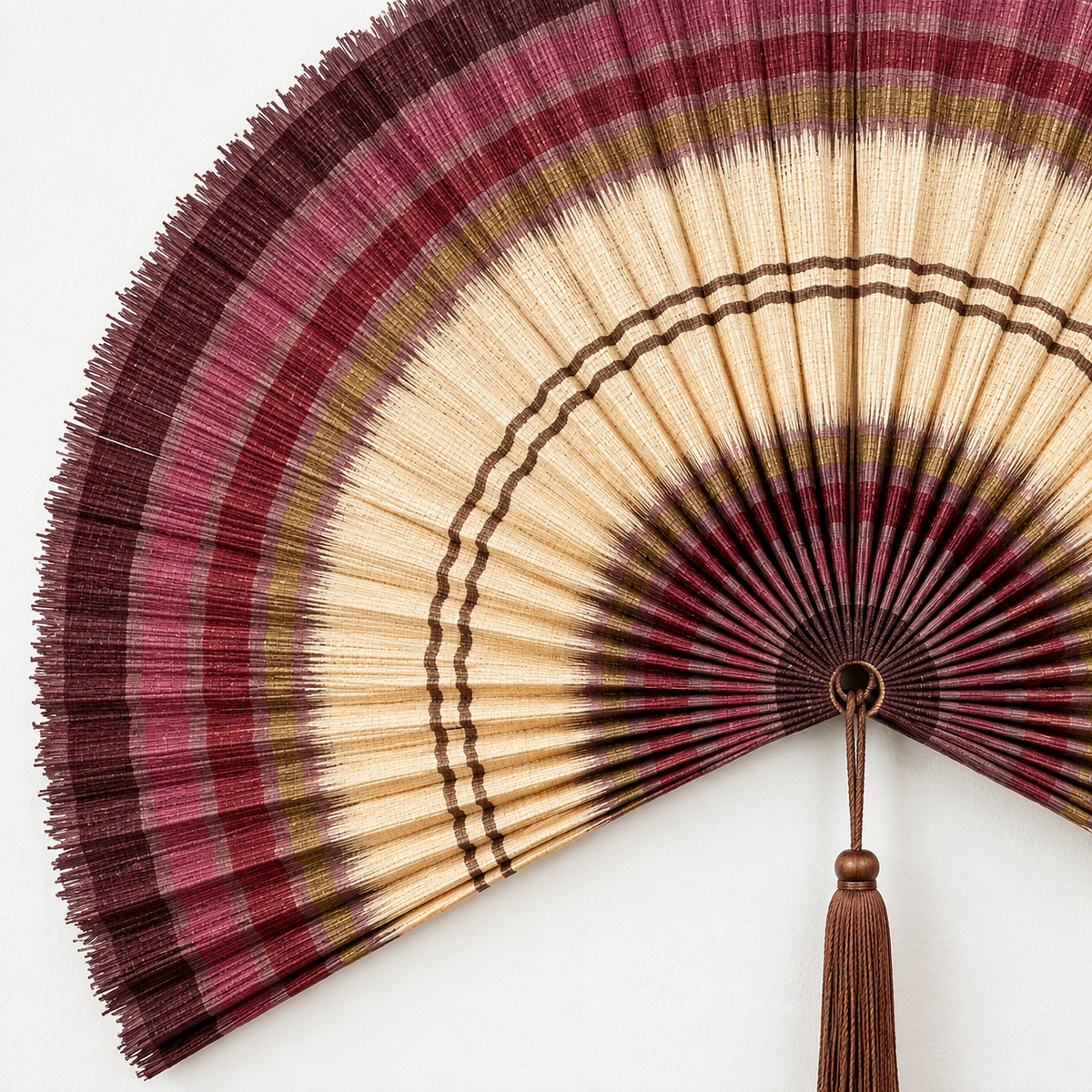 Burgundy & Natural Striped woven wall fan texture and tassel detail