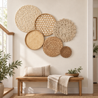 Layered woven basket wall decor beside a staircase entryway